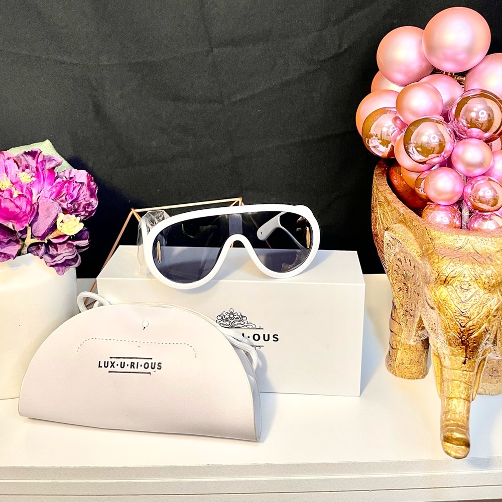 LUX.U.RI.OUS BRAND WAVE SUNGLASSES .Colors Are Black , White , Silver, Brown ,